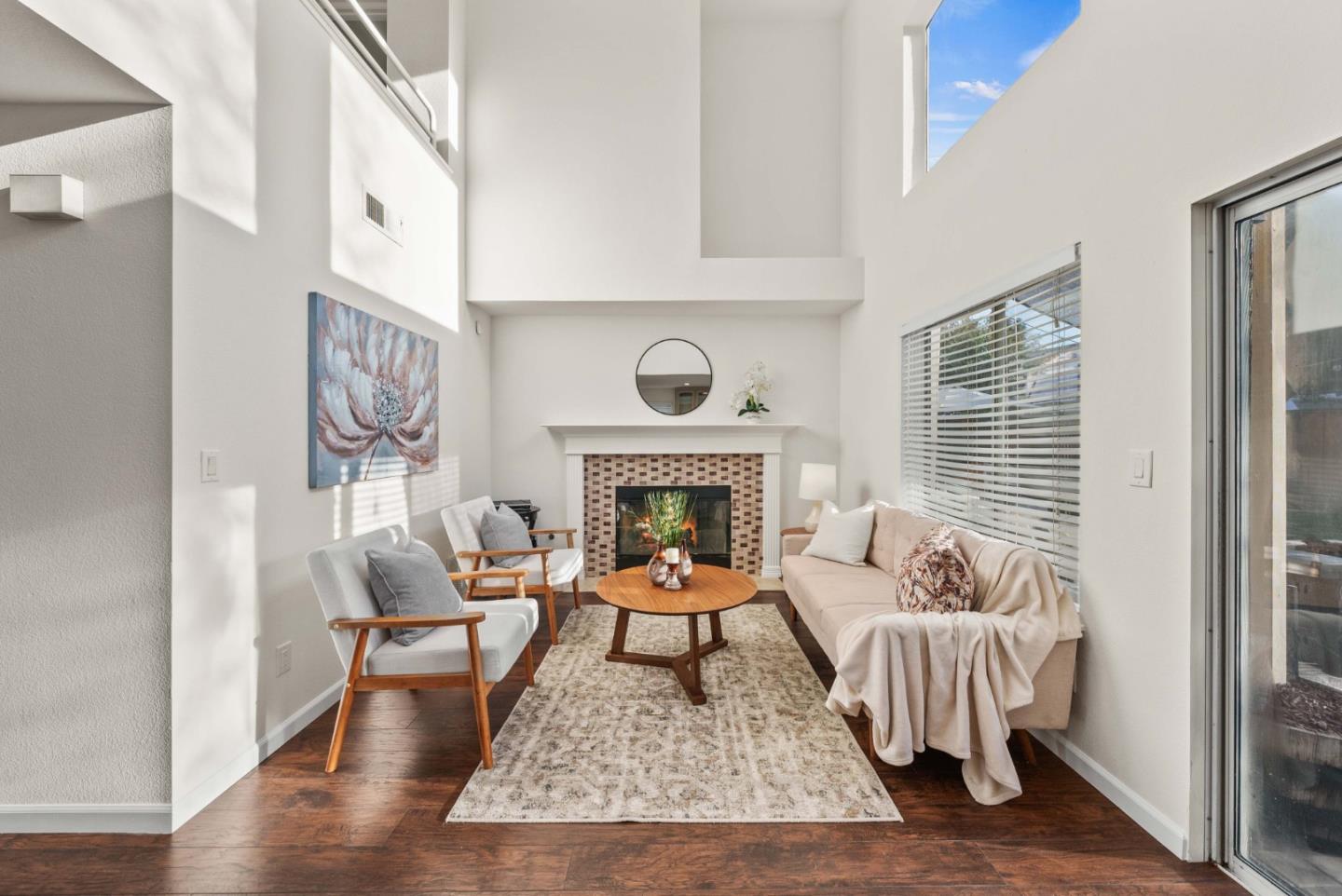 7385 Forsum Road San Jose, CA 95138 - Photo 9 of 40 a living room with furniture and a fireplace