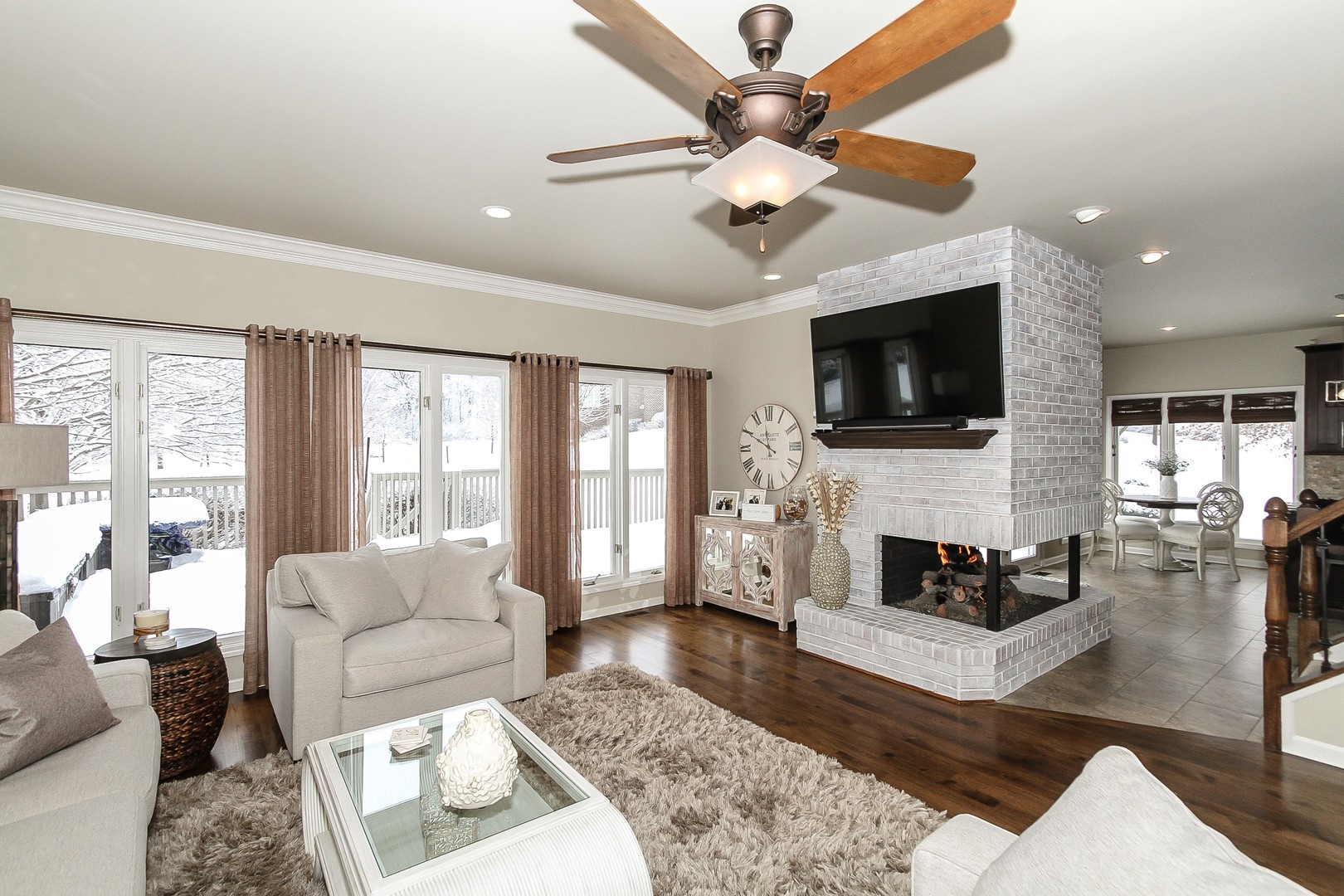 6N734 Henricksen Road St. Charles, IL 60175 - Photo 14 of 40 a living room with furniture fireplace and flat screen tv