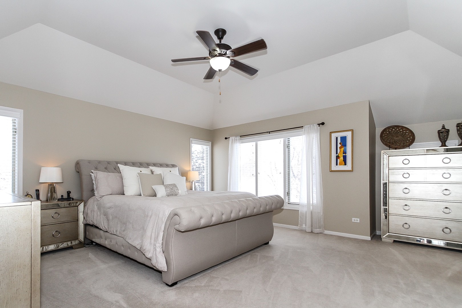 6N734 Henricksen Road St. Charles, IL 60175 - Photo 15 of 40 a bedroom with a bed and a ceiling fan