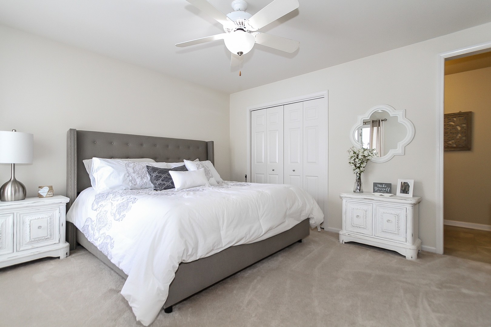 6N734 Henricksen Road St. Charles, IL 60175 - Photo 17 of 40 a bed room with a bed and a chandelier