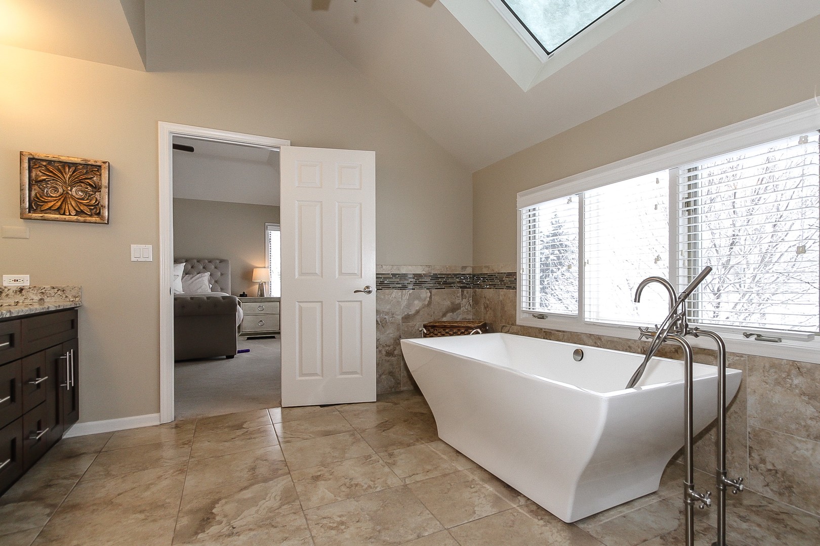6N734 Henricksen Road St. Charles, IL 60175 - Photo 20 of 40 a bathroom with a bathtub and a sink