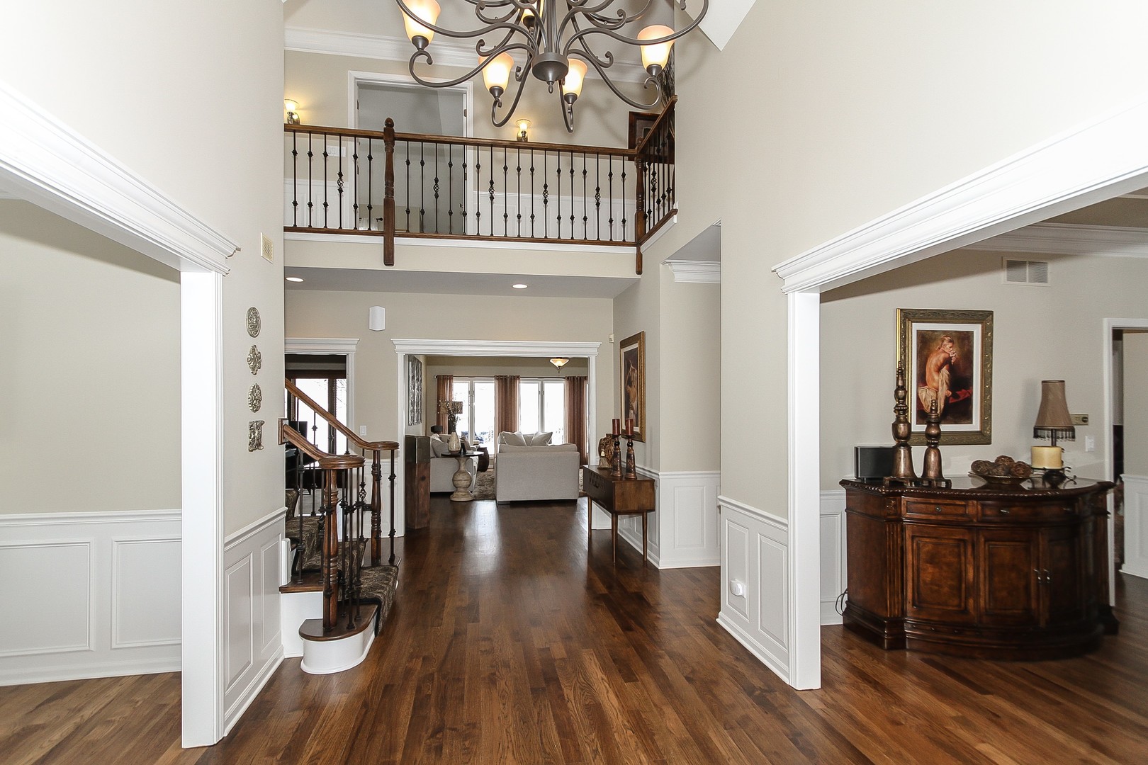 6N734 Henricksen Road St. Charles, IL 60175 - Photo 3 of 40 a view of front door with dining room and wooden floor