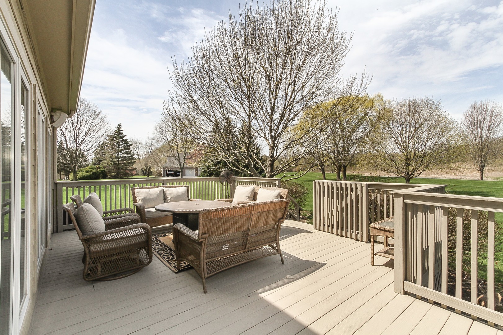 6N734 Henricksen Road St. Charles, IL 60175 - Photo 30 of 40 a roof deck with couches and wooden fence