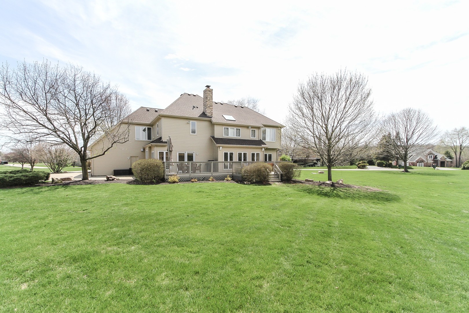 6N734 Henricksen Road St. Charles, IL 60175 - Photo 40 of 40 a view of a big house with a big yard and large trees