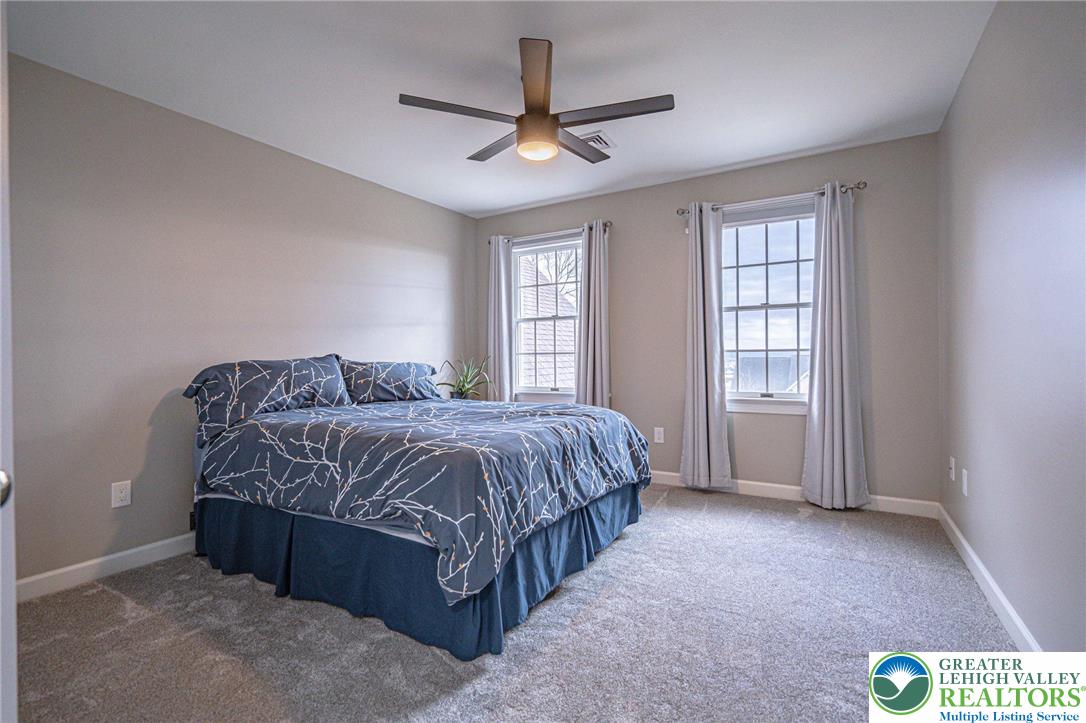 6551 Overlook Road Orefield, PA 18069 - Photo 50 of 82 a spacious bedroom with a bed and window