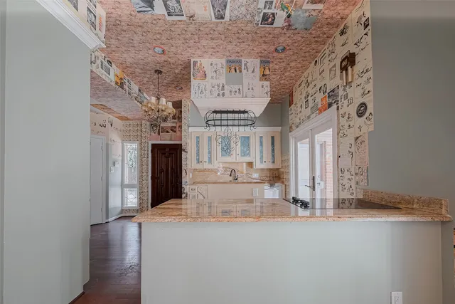 a view of a fireplace with a hallway