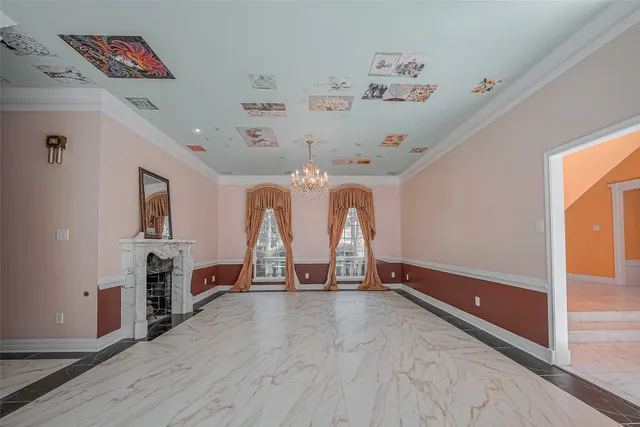 wooden floor in kitchen and a refrigerator