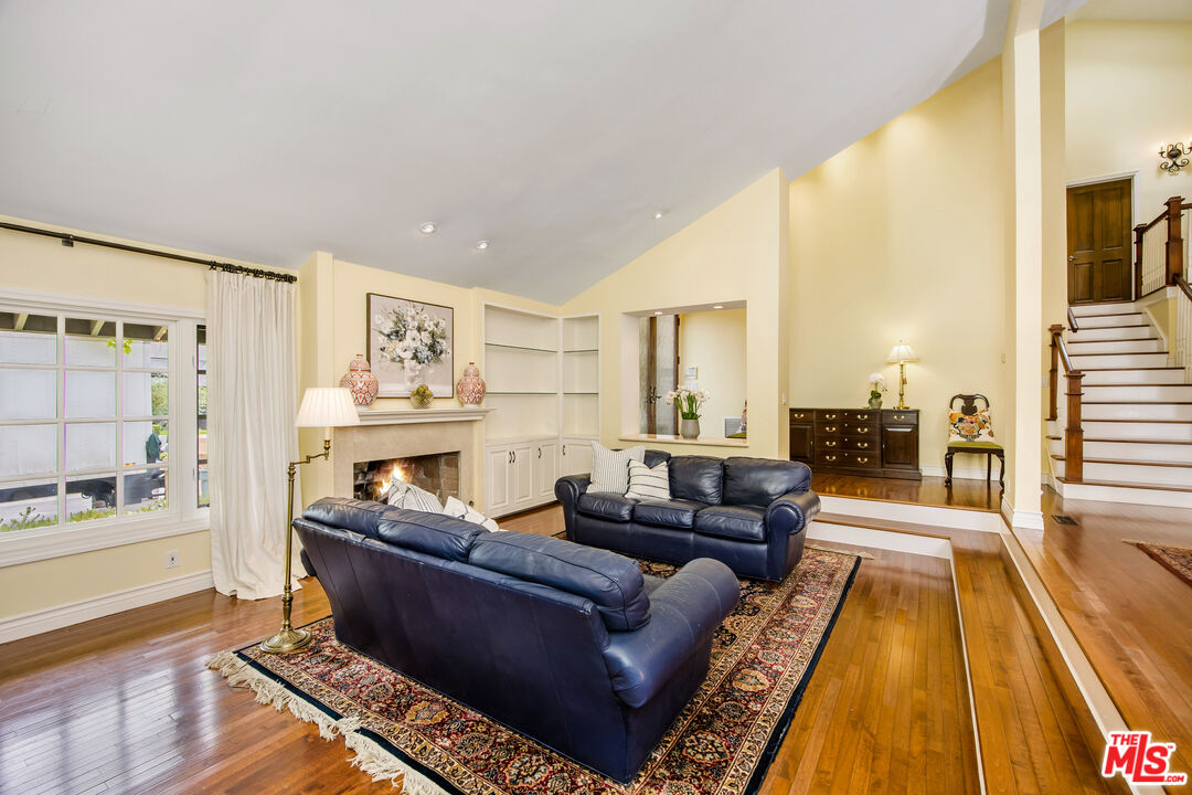 2124 Eric Drive Los Angeles, CA 90049 - Photo 7 of 30 a living room with furniture and a rug