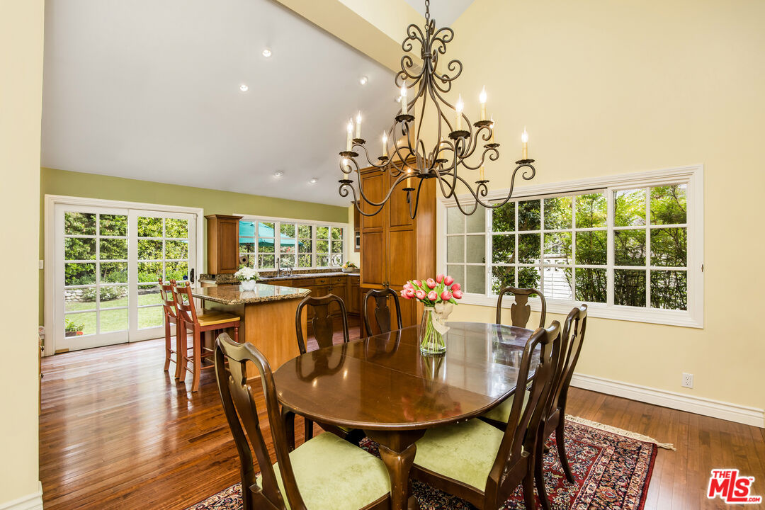 2124 Eric Drive Los Angeles, CA 90049 - Photo 9 of 30 a view of a dining room with furniture window and outside view