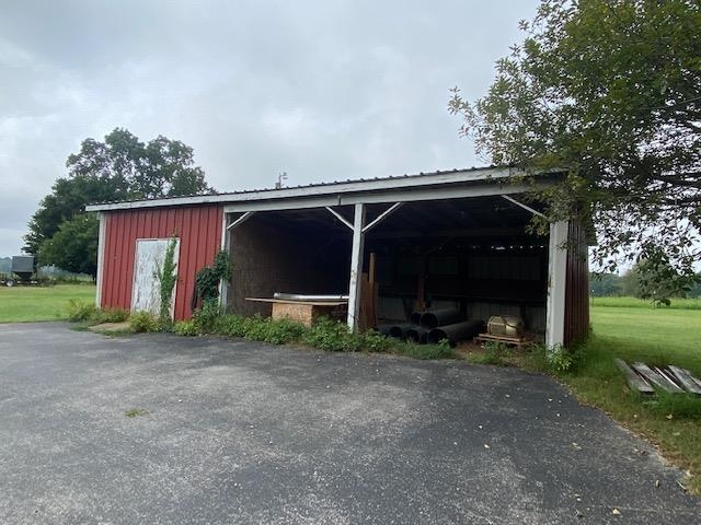 311 Rabbit Trail Road Leoma, TN 38468 - Photo 10 of 23 a view of a house with backyard and garden