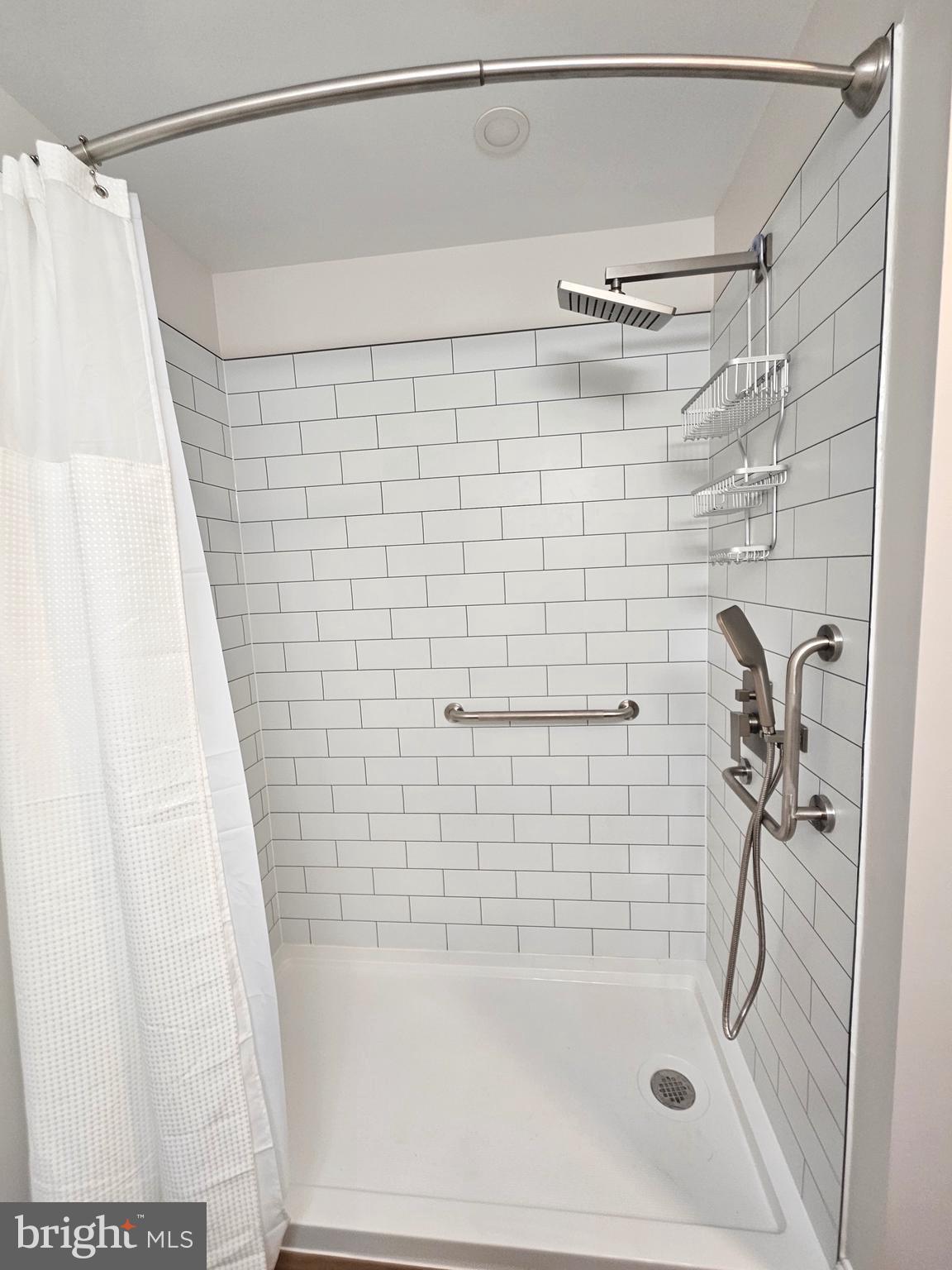 14400 Reva Road Reva, VA 22735 - Photo 12 of 14 a bathroom with a shower and a bath tub