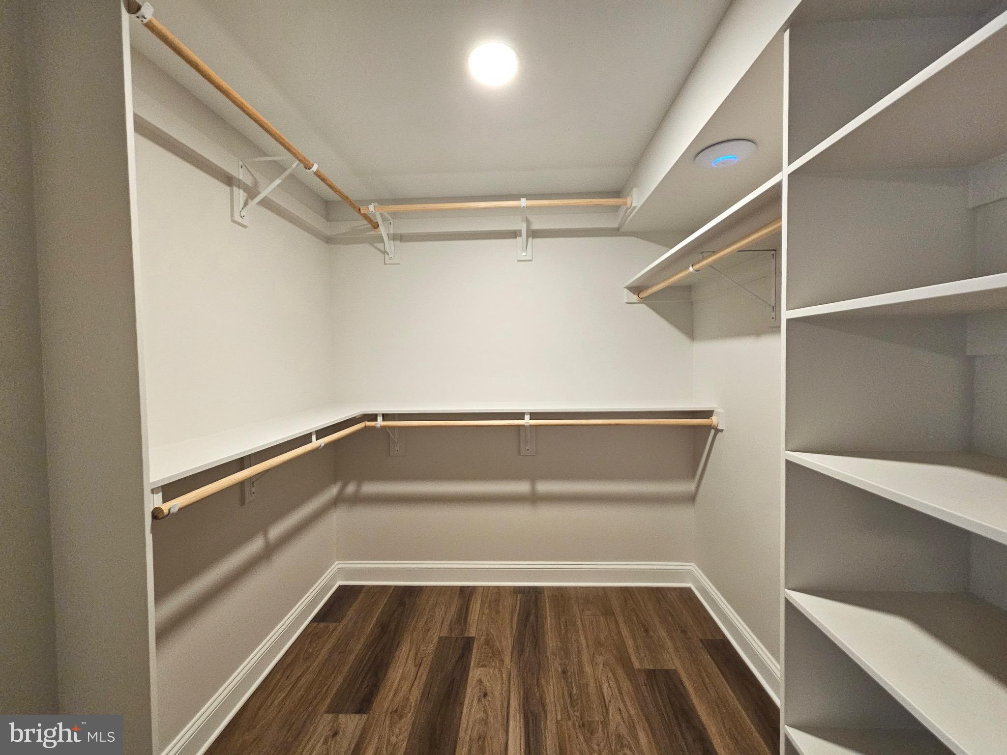 14400 Reva Road Reva, VA 22735 - Photo 10 of 14 a view of walk in closet with empty racks