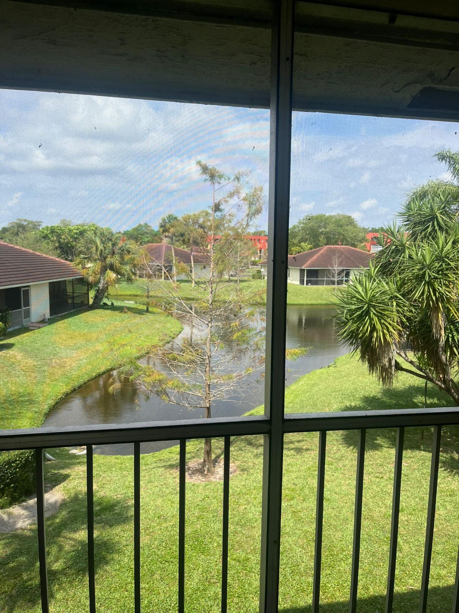 9993 Three Lakes Circle Boca Raton, FL 33428 - Photo 12 of 22 a view of lake from a balcony