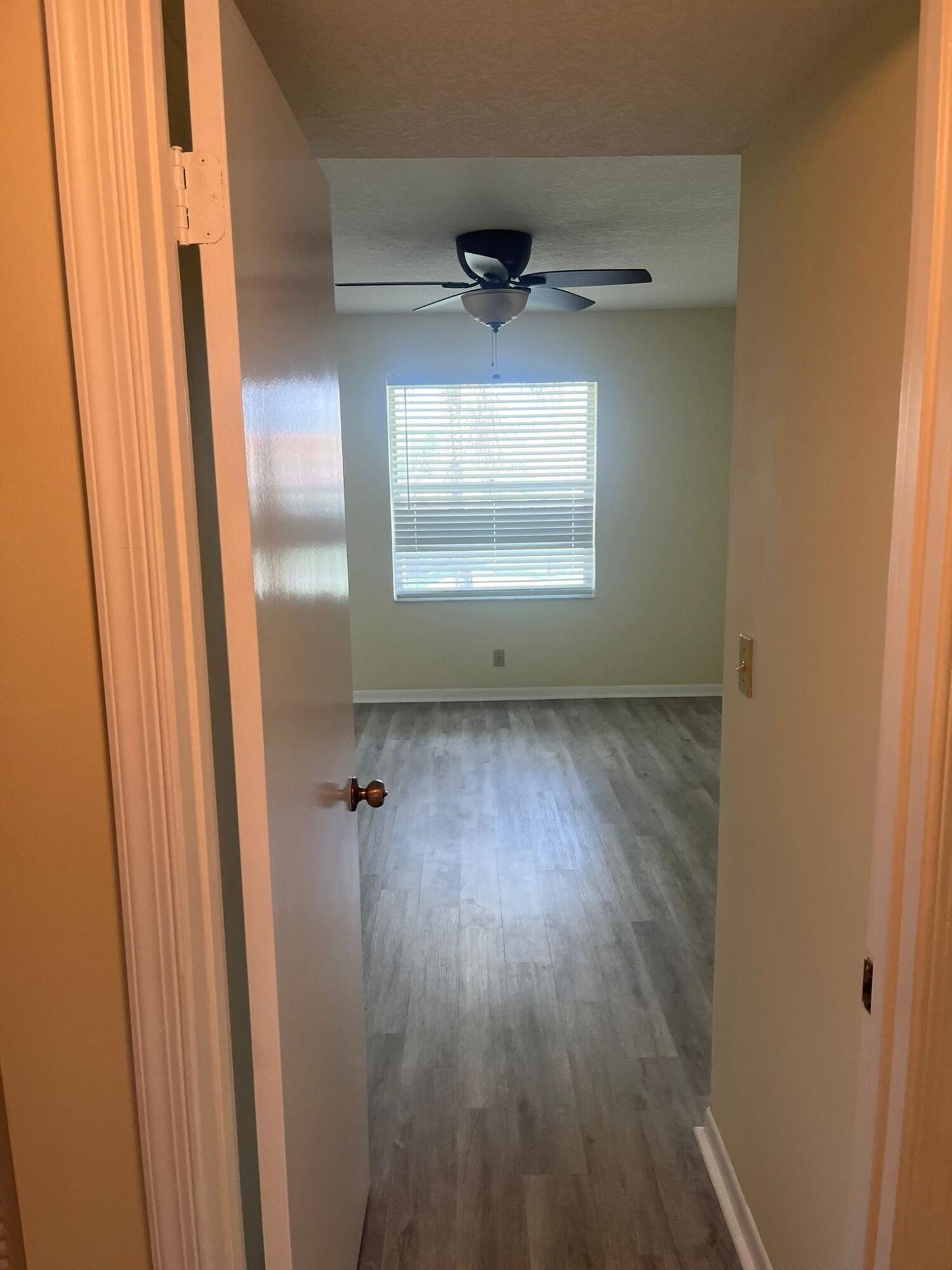 9993 Three Lakes Circle Boca Raton, FL 33428 - Photo 17 of 22 wooden floor in an empty room