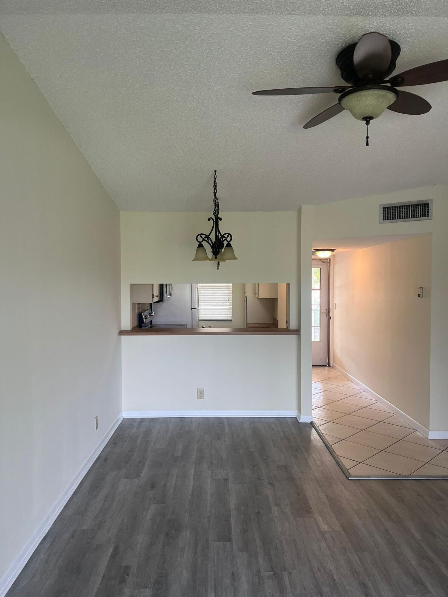 9993 Three Lakes Circle Boca Raton, FL 33428 - Photo 6 of 22 a view of a kitchen with a sink and a window