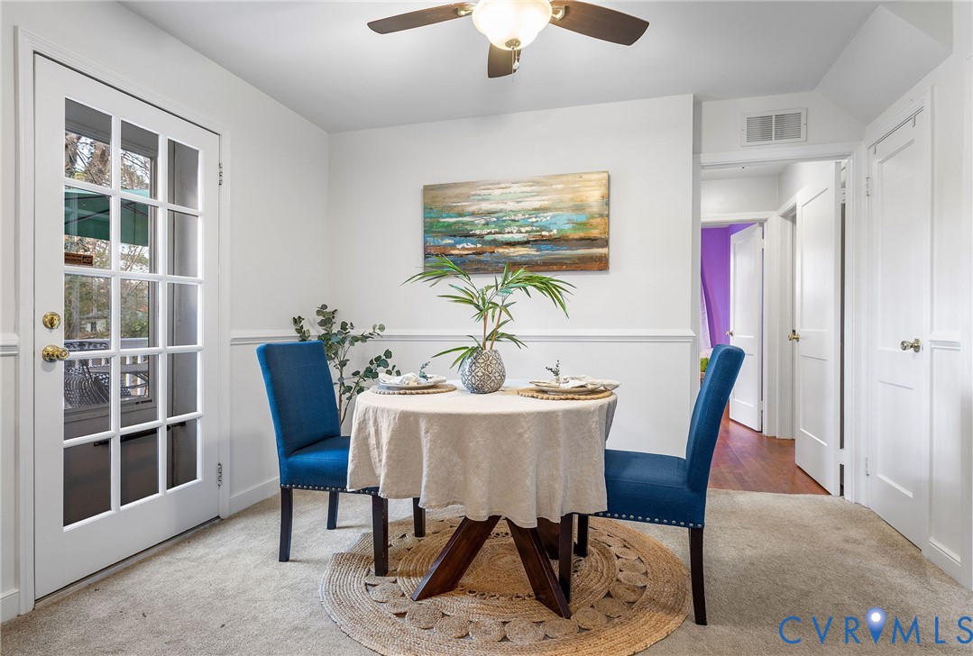 6020 Bonneau Road Richmond, VA 23227 - Photo 11 of 36 a view of a dining room with furniture window and outside view