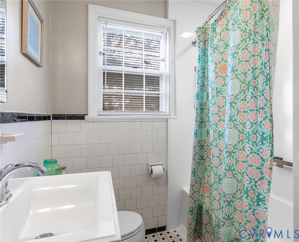 6020 Bonneau Road Richmond, VA 23227 - Photo 19 of 36 a bath room with a sink and a toilet