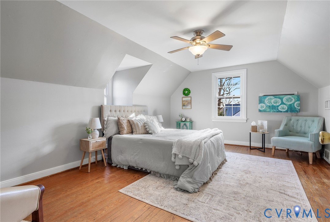 6020 Bonneau Road Richmond, VA 23227 - Photo 20 of 36 a living room with furniture and a chandelier