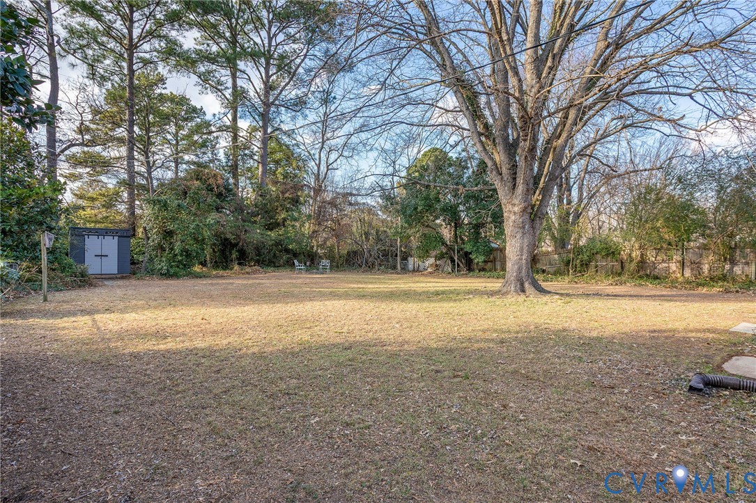 6020 Bonneau Road Richmond, VA 23227 - Photo 26 of 36 a view of house with yard and trees