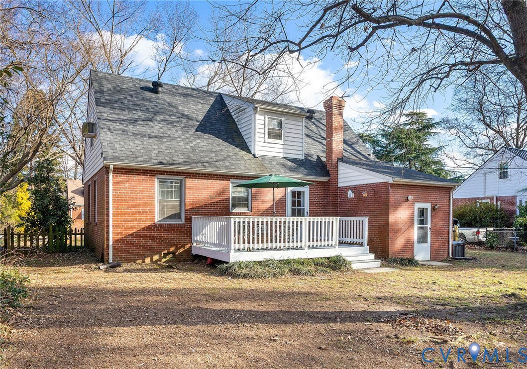 6020 Bonneau Road Richmond, VA 23227 - Photo 29 of 36 a front view of a house with a yard and garage