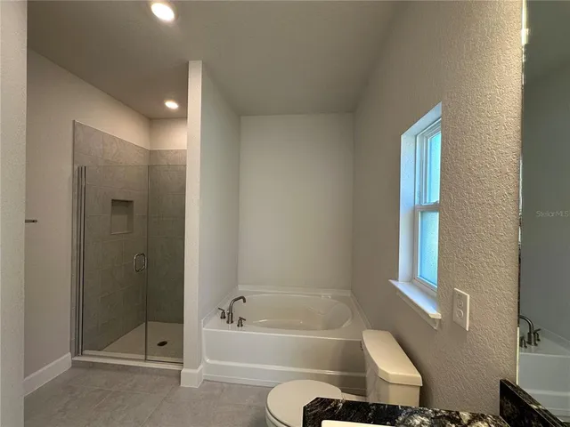 a kitchen that has a sink and a stove