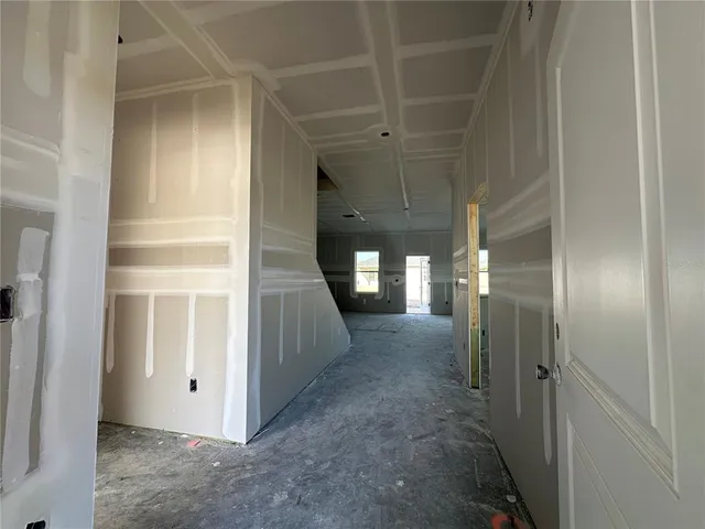 a view of an empty room with a bathtub