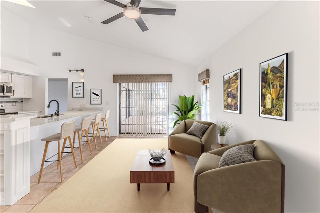 1382 Aladdin Road Spring Hill, FL 34609 - Photo 19 of 45 a living room with furniture and a window