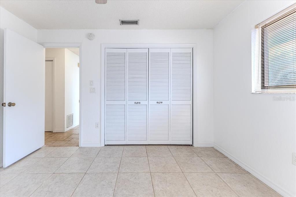 1382 Aladdin Road Spring Hill, FL 34609 - Photo 27 of 45 a view of an empty room with closet area