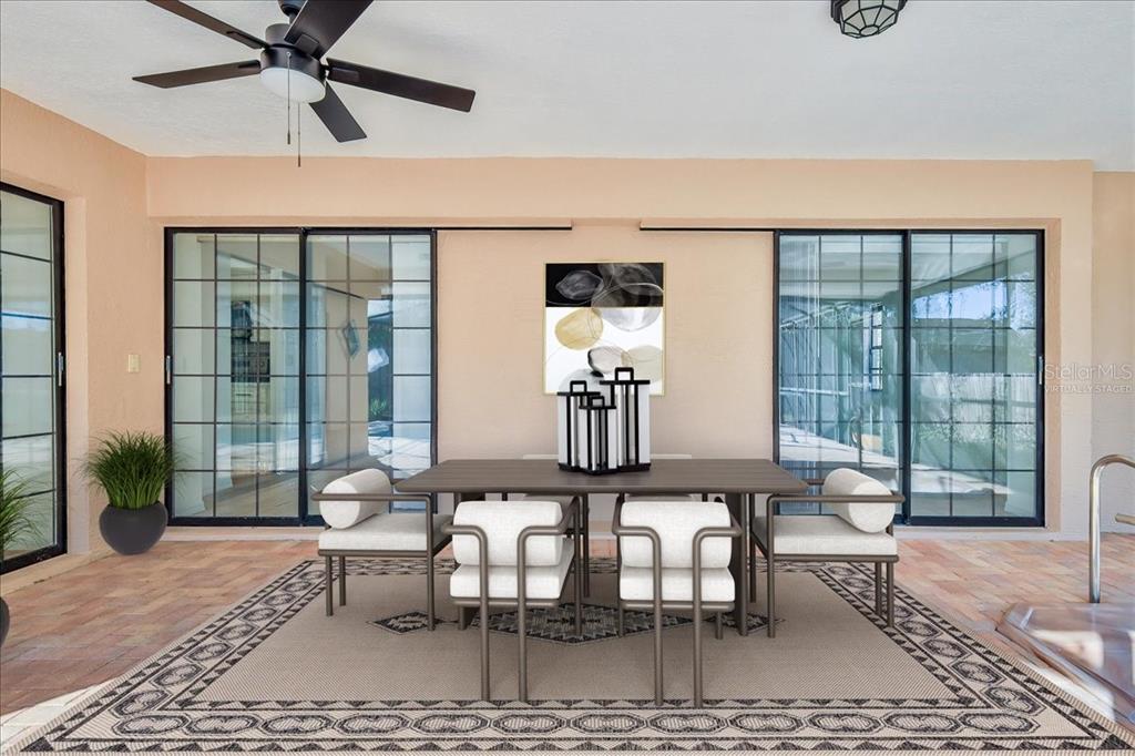 1382 Aladdin Road Spring Hill, FL 34609 - Photo 3 of 45 a dining room with furniture and window
