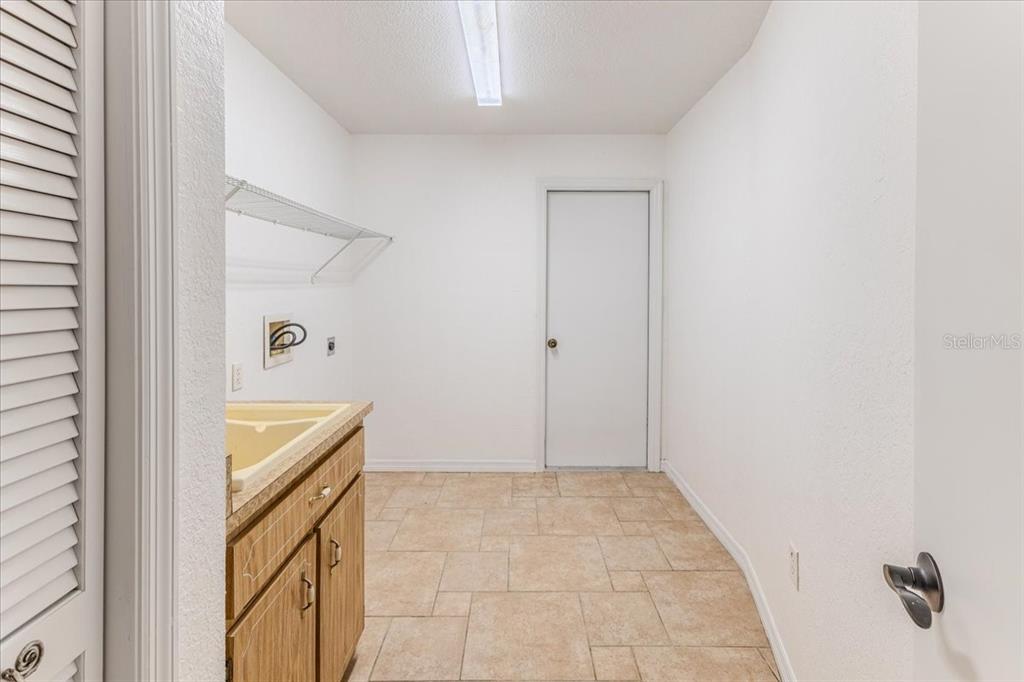 1382 Aladdin Road Spring Hill, FL 34609 - Photo 33 of 45 a view of an empty room