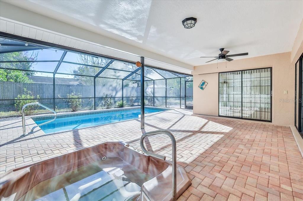 1382 Aladdin Road Spring Hill, FL 34609 - Photo 37 of 45 a view of a livingroom with furniture and a window