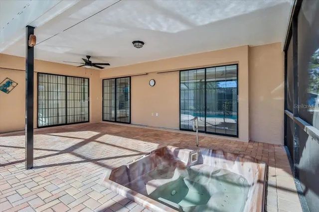 a view of an empty room with glass door