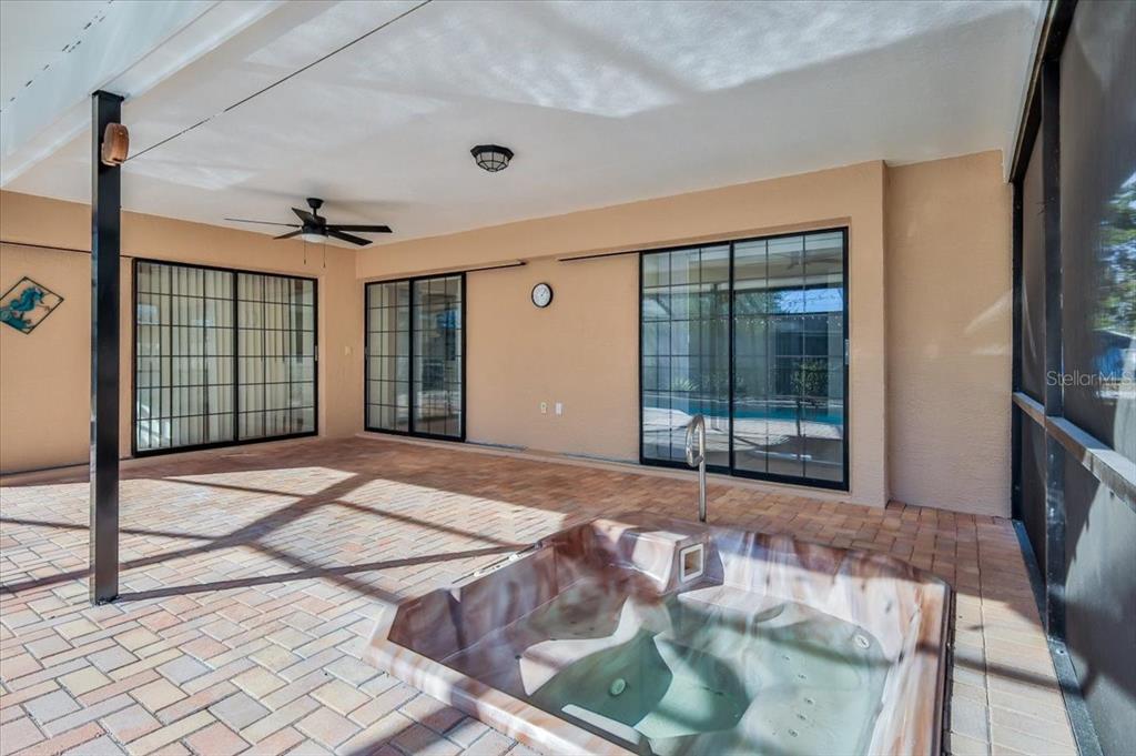 1382 Aladdin Road Spring Hill, FL 34609 - Photo 40 of 45 a view of an empty room with glass door