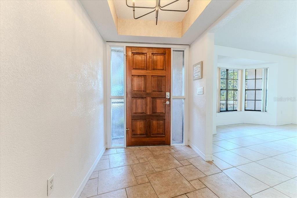 1382 Aladdin Road Spring Hill, FL 34609 - Photo 5 of 45 an empty room with windows