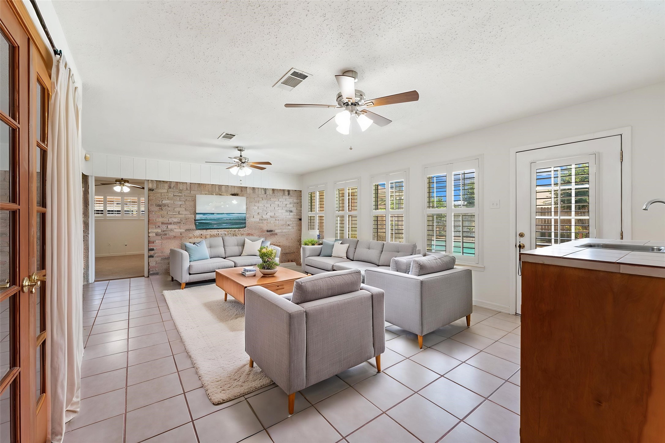 983 West Donovan Street Houston, TX 77091 - Photo 13 of 46 Sun Room virtually staged for you!- overlooking the backyard pool ready for summer entertaining and family get togethers!