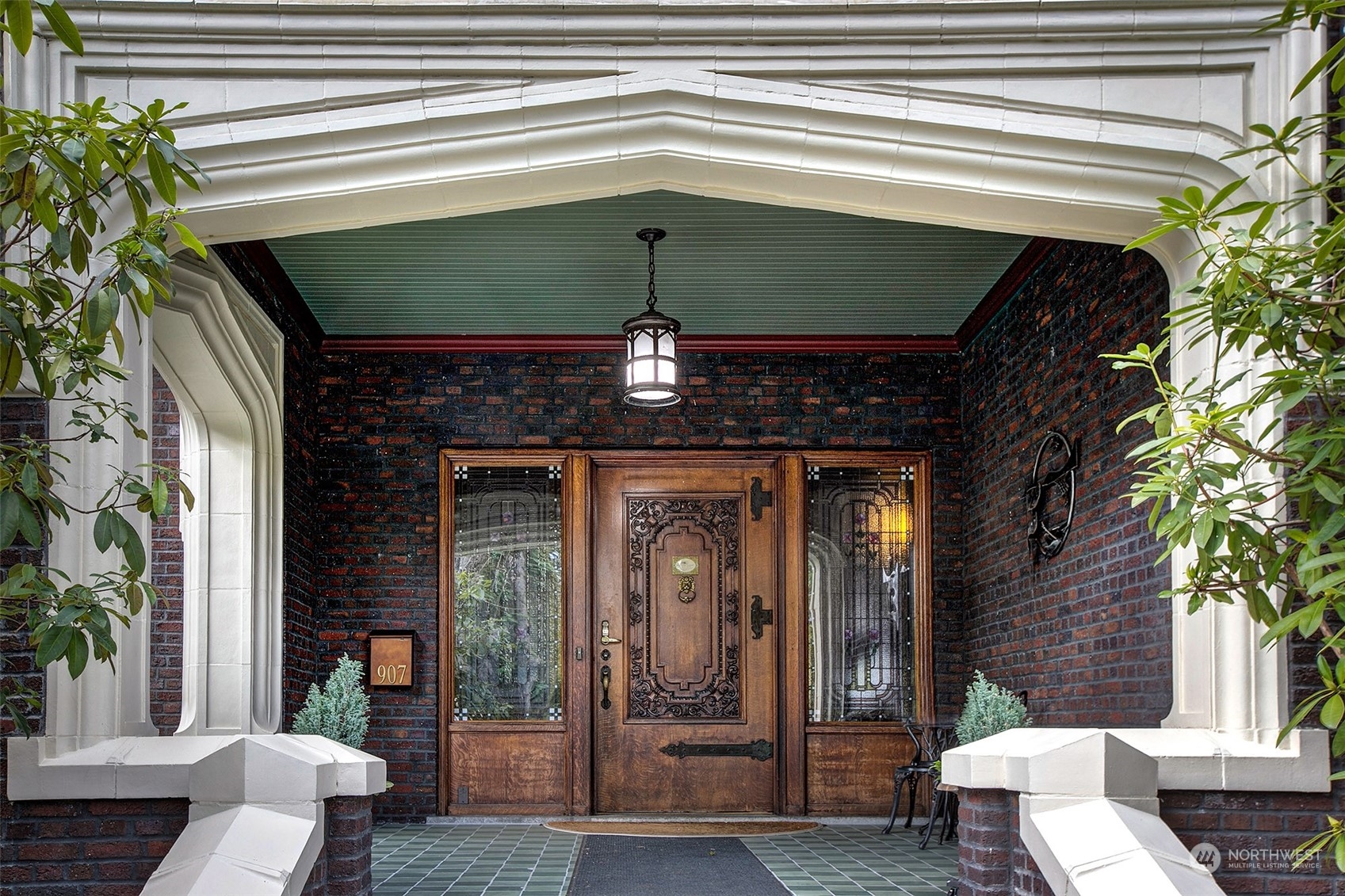 a front view of a house with a porch