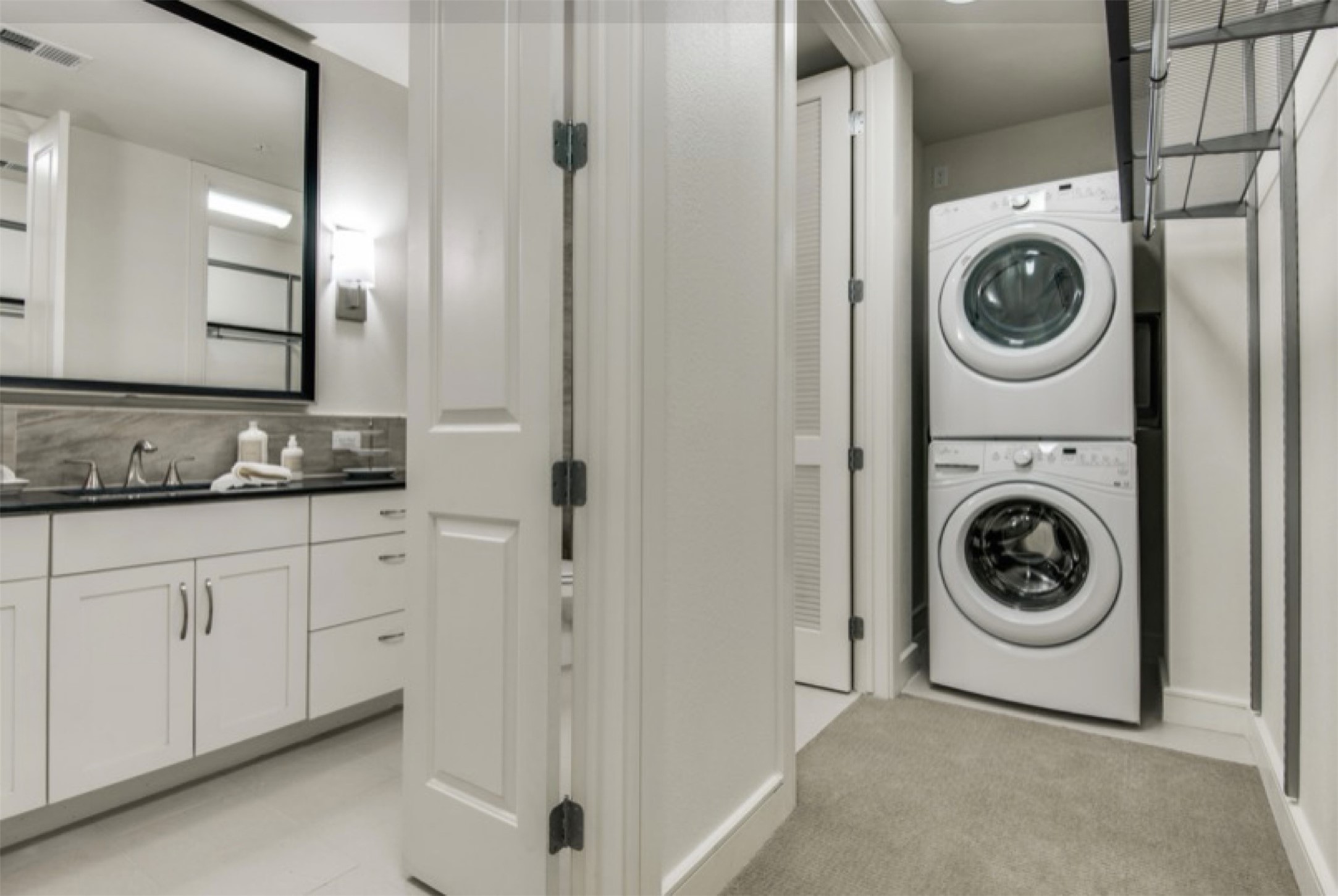 2303 Mid Lane, Unit 710 Houston, TX 77027 - Photo 11 of 19 a view of a washer and dryer in a utility room