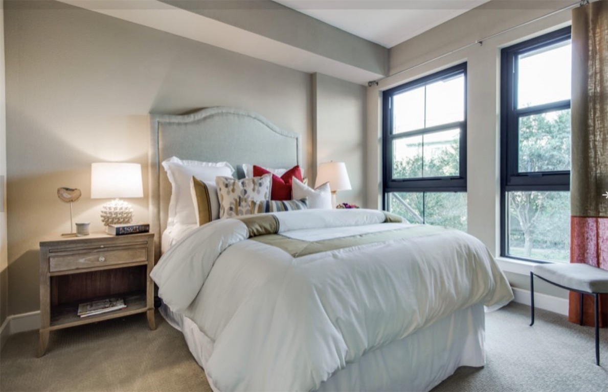 2303 Mid Lane, Unit 710 Houston, TX 77027 - Photo 5 of 19 a bedroom with a bed and a window