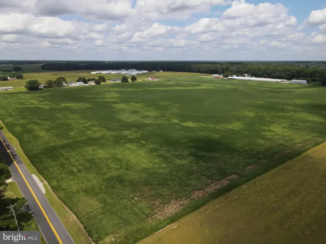 a view of a field with an outdoor space