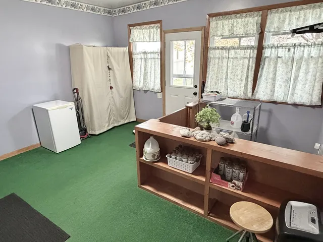 a room with furniture and a window