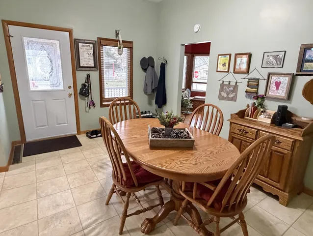 a view of a dining room with furniture