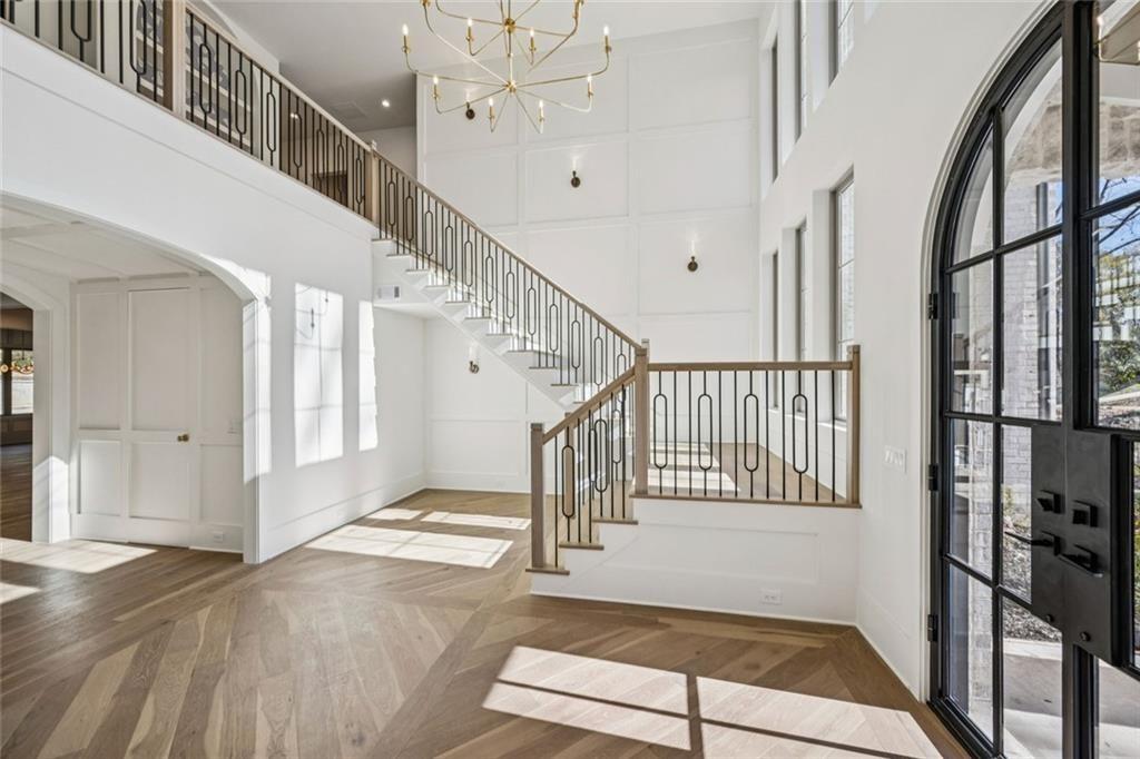 2854 North Thompson Road Northeast Brookhaven, GA 30319 - Photo 3 of 34 a view of entryway and hall with wooden floor