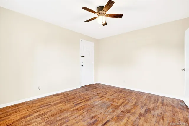 a view of a big room with wooden floor