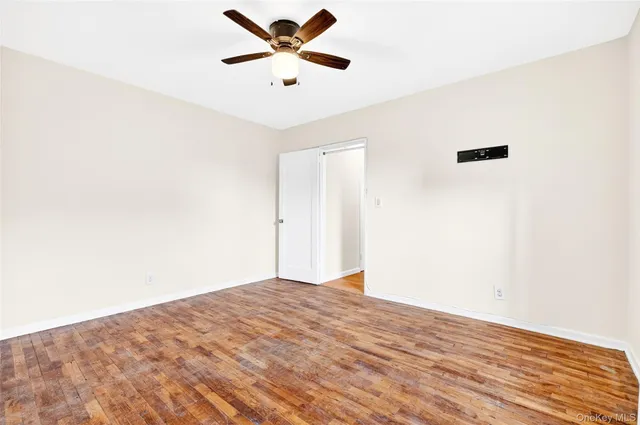 a view of a big room with wooden floor