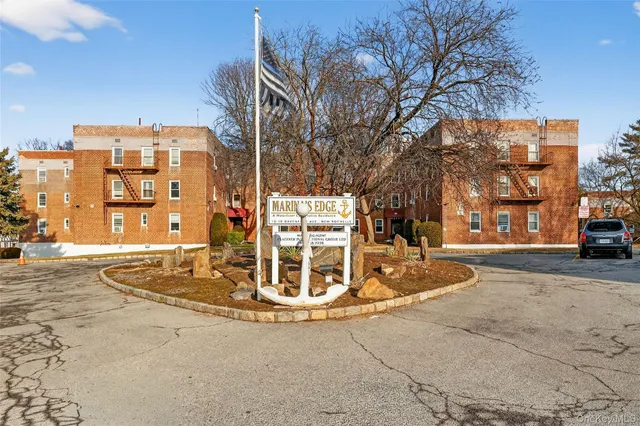 a view of a building with a street