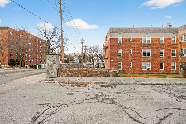 a view of a building with a road