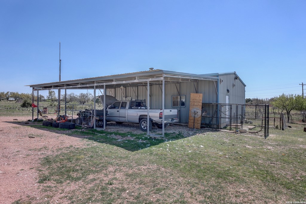1443 Gina Road Harper, TX 78631 - Photo 7 of 49 a view of a house with a yard and sitting area