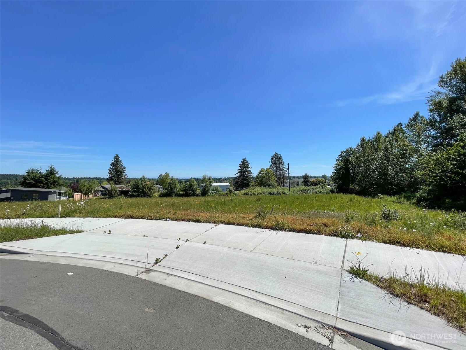 862 South Still Road Sequim, WA 98382 - Photo 1 of 15 a view of a road with a yard