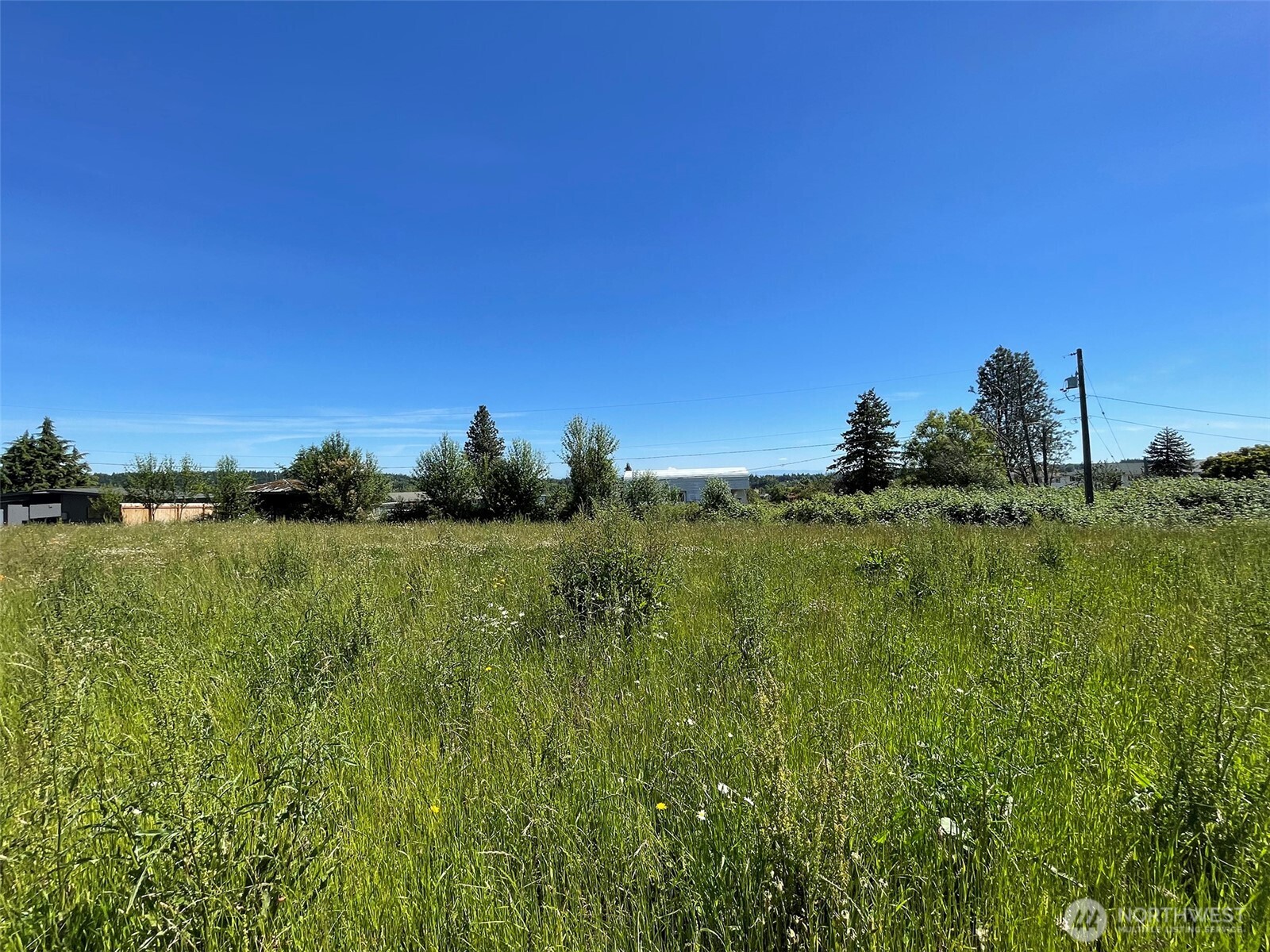 862 South Still Road Sequim, WA 98382 - Photo 12 of 15 a view of a lake and green valley