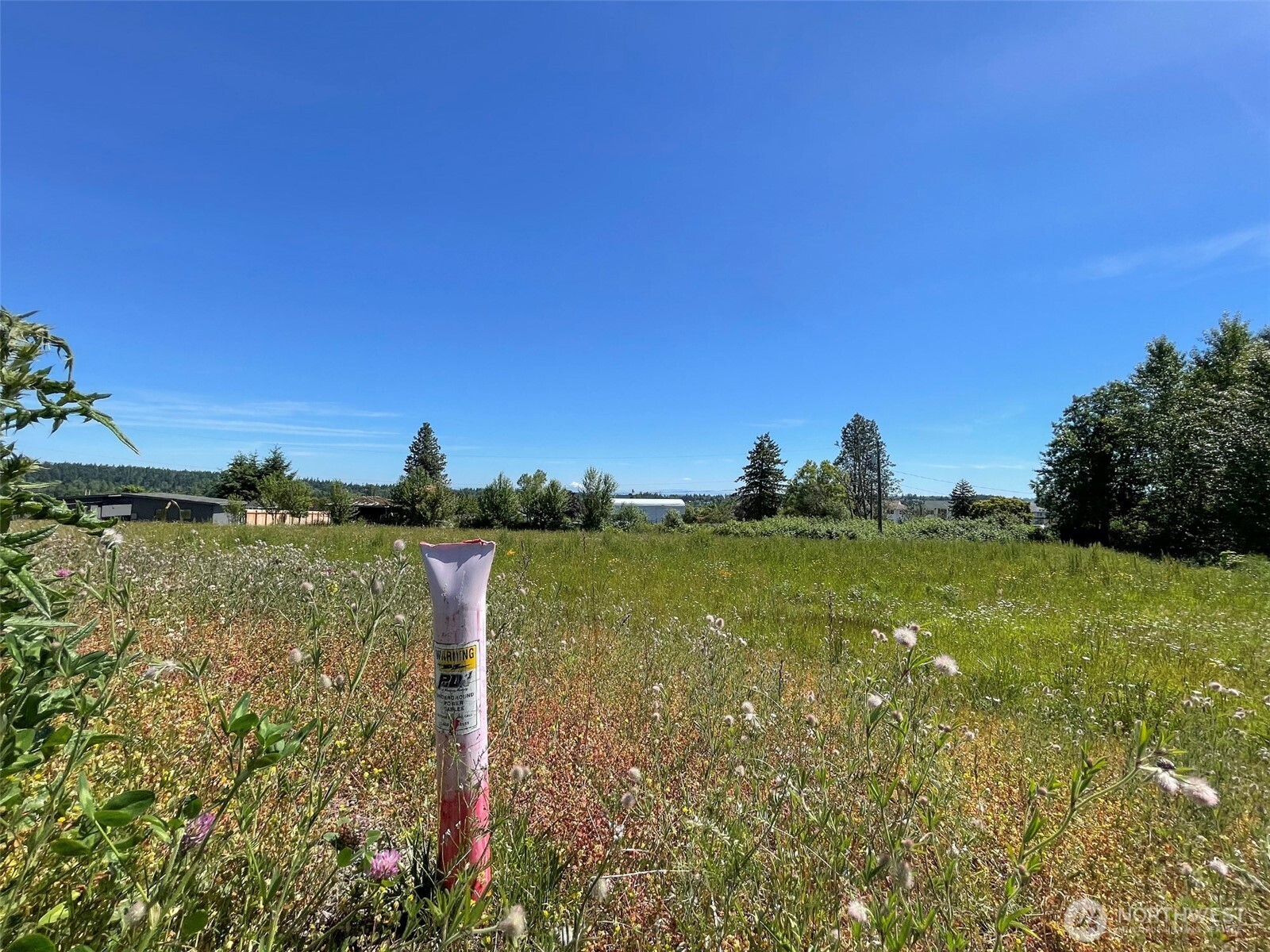 862 South Still Road Sequim, WA 98382 - Photo 8 of 15 a view of a lake with a yard